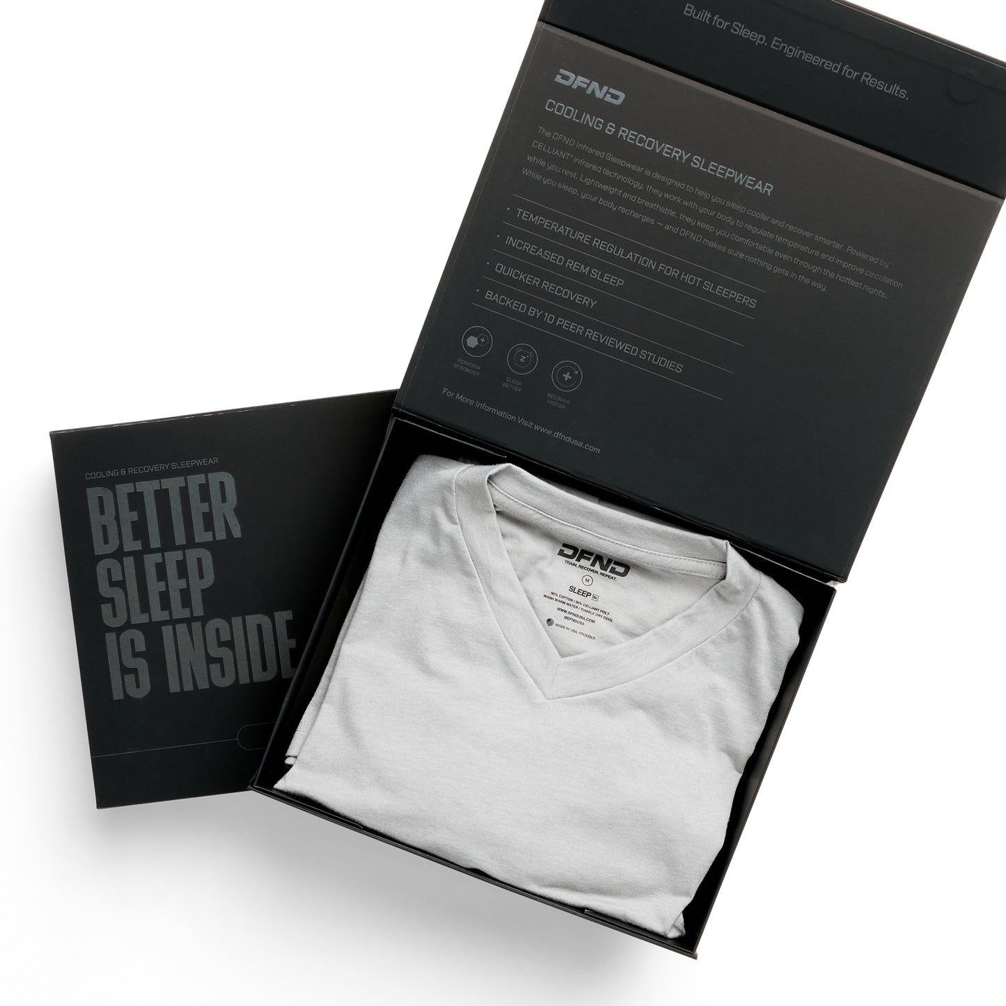 A white DFND Cooling Recovery Sleepwear Long John is neatly folded in an open black box labeled "DFND," featuring CELLIANT minerals for restful sleep. The lid displays product info and promises, "Better Sleep is Inside.