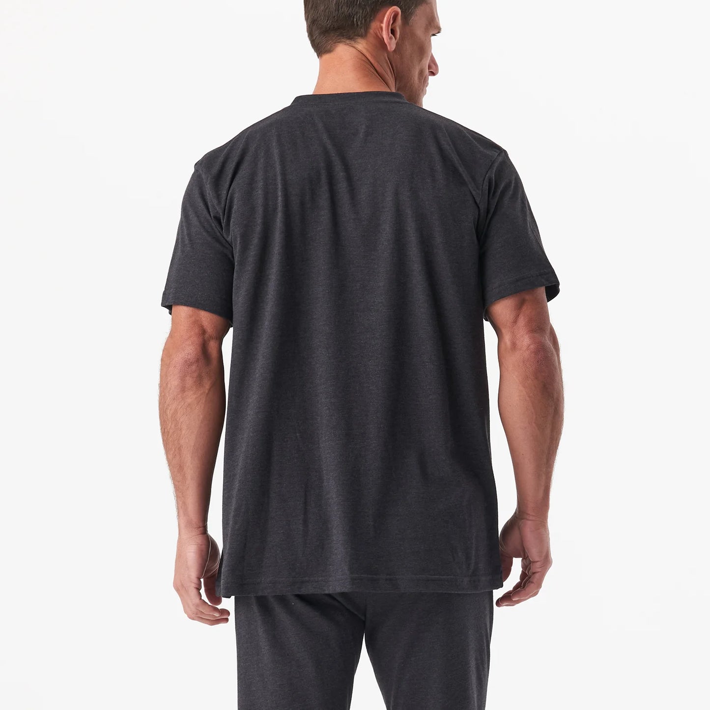 A man is shown from the back against a plain white background, wearing a dark gray DFND Sleepwear SS Shirt & Shorts set.
