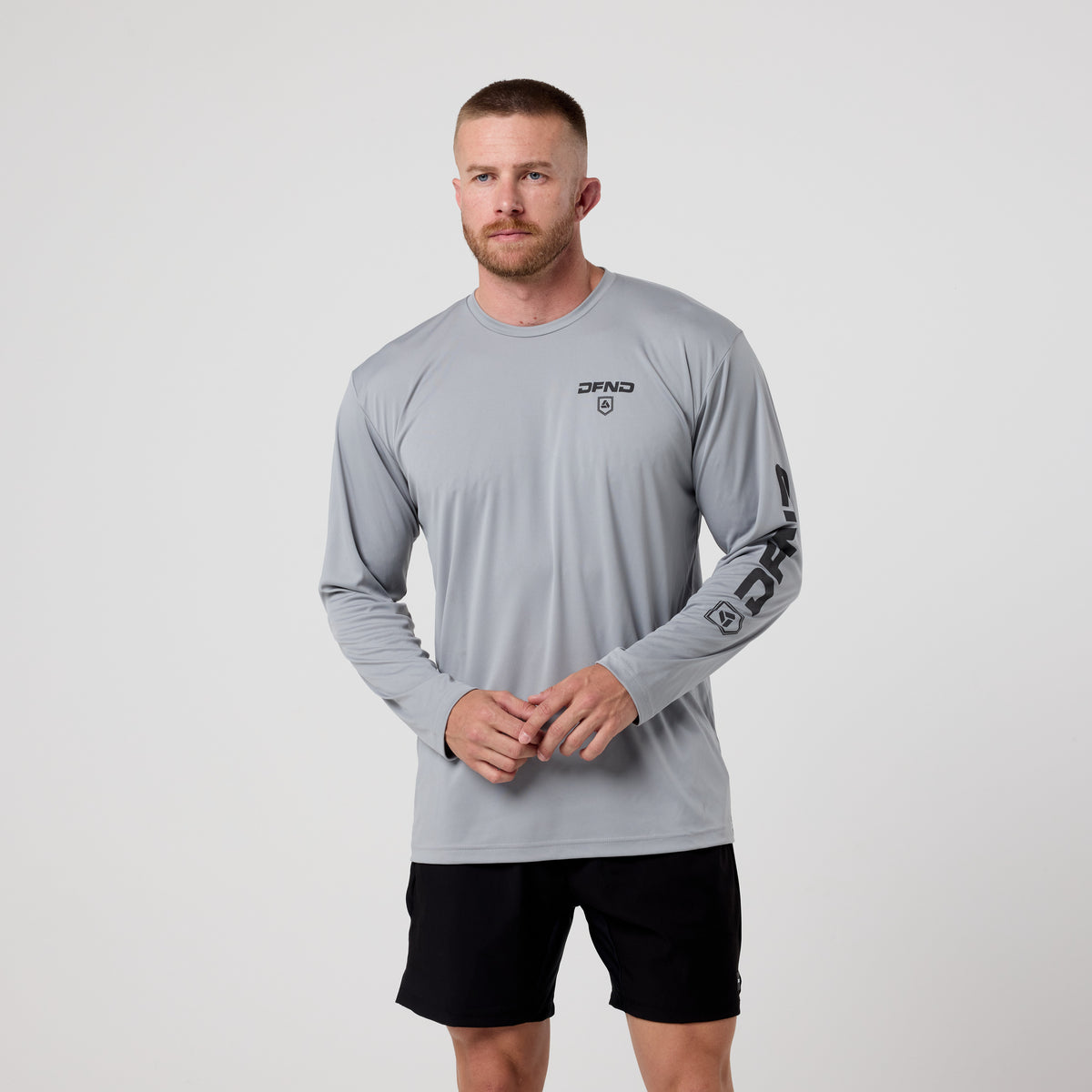 Men's Speed Tech DFND Logo Long Sleeve Workout Shirt | Training Gear