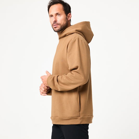 A man wearing the DFND Memphis Fleece Hood and black pants stands sideways against a white background with a neutral expression—perfect for cold weather training.